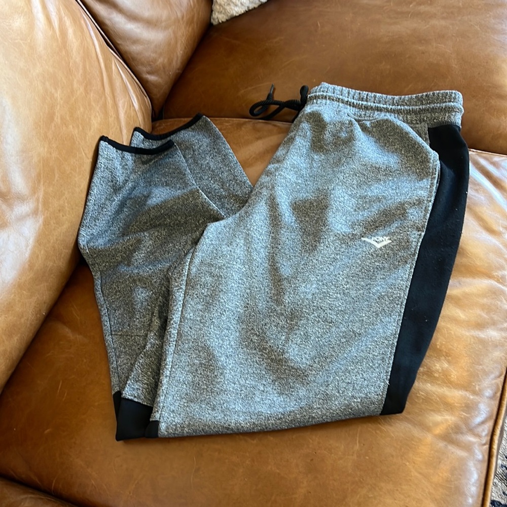 Athletic pants black and grey with pockets and draw string.
